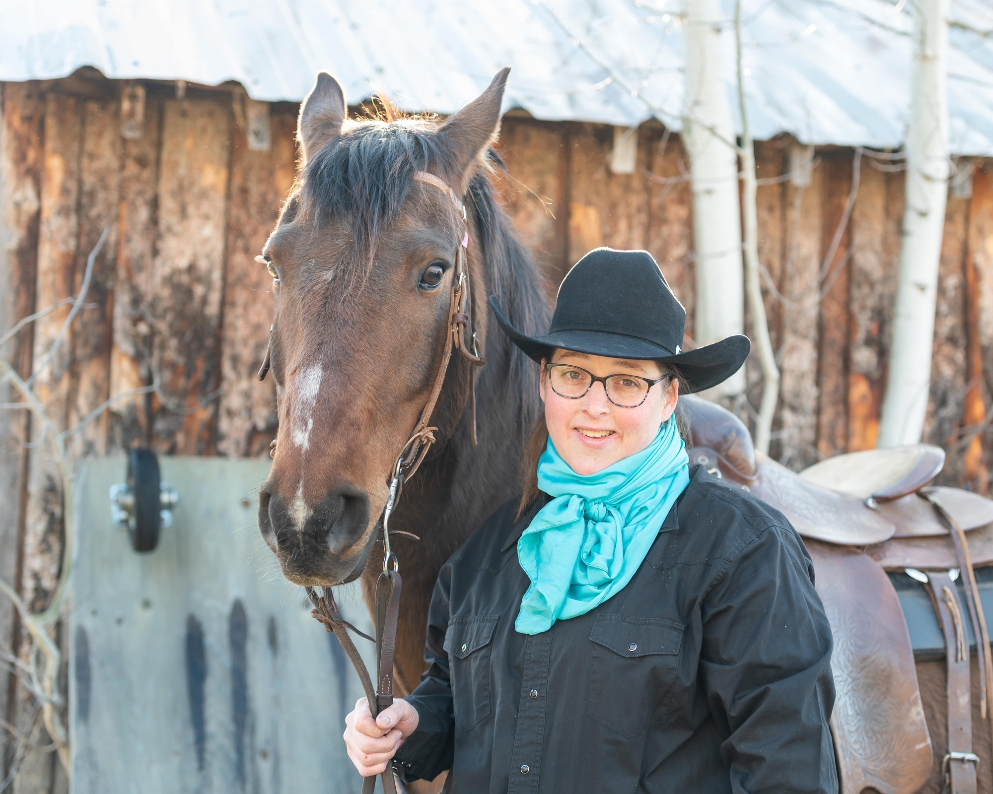 Headshot of Coach Amy and her horse Einstein